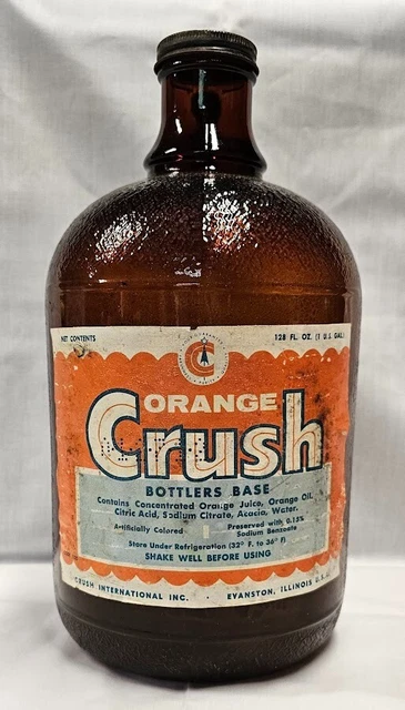 1 gallon amber syrup jug with original paper label. Free of chips, cracks or da