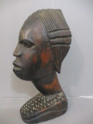 African art: tribal art, a wooden carved sculpture of young girl, Africa,60's