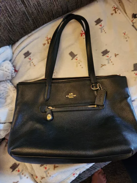 Coach Taylor Tote Shoulder Bag  black Pebble Leather gently carried.