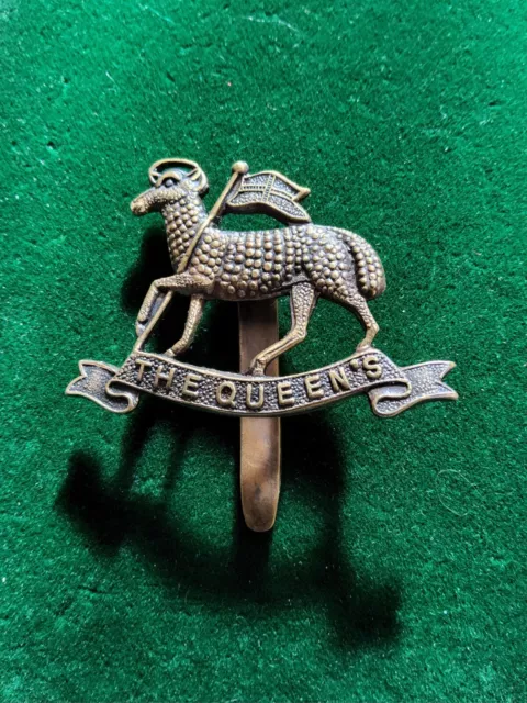 Genuine WW1 era The Queen’s West Surrey Regiment Brass Economy Issue Cap Badge