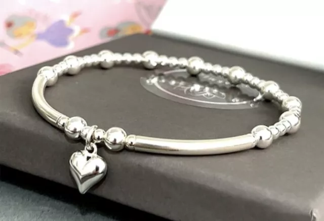 charmed sterling silver stretch stacking bracelet with a 3d heart charm