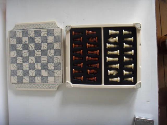 mini shrimshaw style resin chess set