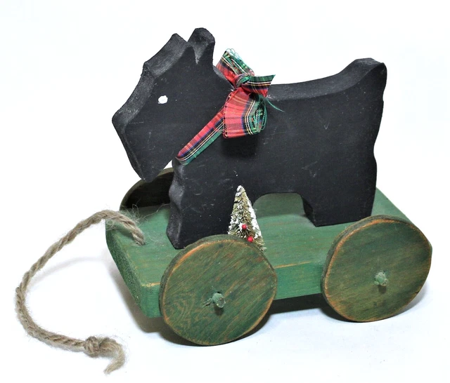 Vinage Folk Art Wood Pull Toy Black Scottie Dog on Green Cart