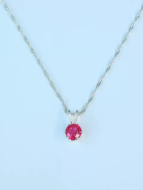 925 silver and ruby ladies  pendant necklace. Beautiful 5mm lab created ruby .