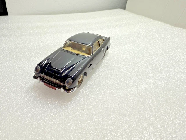 Aston martin db5 solido verem neuve dans sa boite vitrine