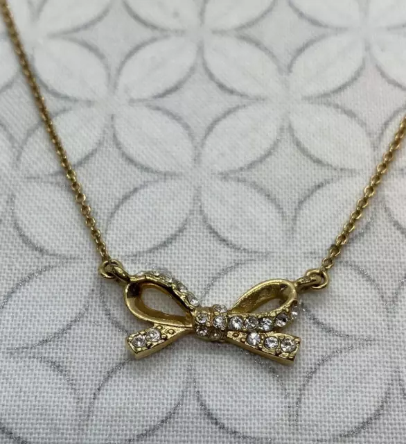 Kate Spade Skinny mini Bow Crystal Pave Necklace Pendant Gold tone Well Used