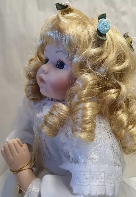 Praying porcelain hot sale doll