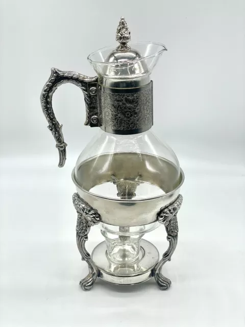 https://www.picclickimg.com/MWQAAOSwNDxlKpdp/Vintage-Silver-Plated-Ornate-Floral-Coffee-Tea-Carafe-Holder.webp