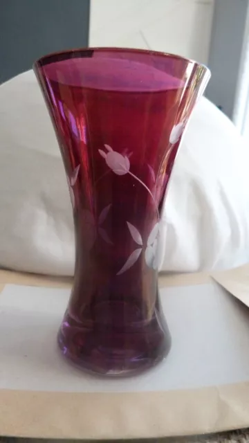 an etched ruby red vase