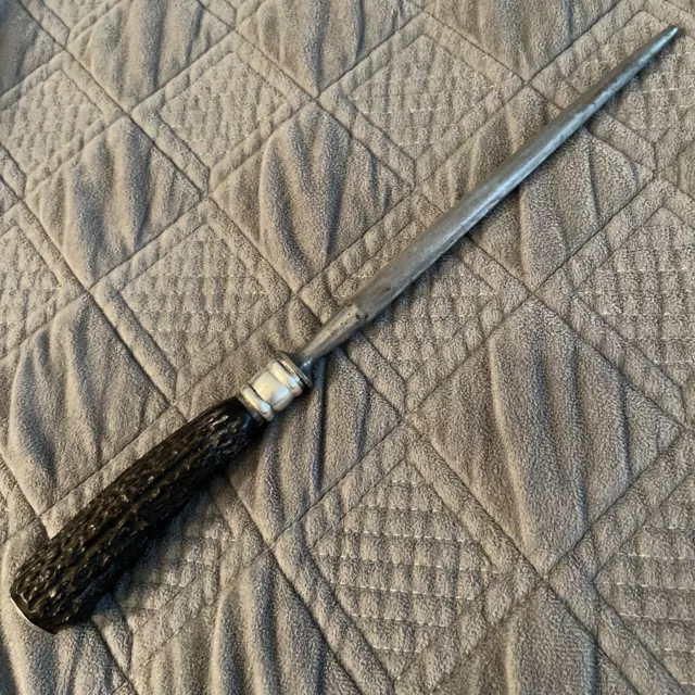 https://www.picclickimg.com/MXgAAOSwgGNlB54r/Vintage-Lees-Sterling-Silver-and-Antler-Knife-Sharpener.webp