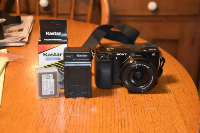 SONY a6000 DIGITAL CAMERA, 16-50 OSS LENS,2 BATT, CHARGER, STRAP, 159 ACTUATIONS