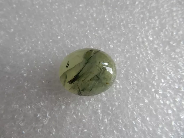 Prehnite, with Epidote inclusions, light green/black, 27.34cts