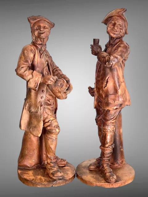 PAIRE DE PERSONNAGES EN TERRE CUITE  DU XVIIIe SIGNÉS  " HOLAIN 1761  "