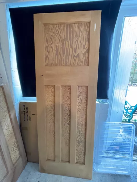 Reclaimed 1930s 1 over 3 panel stripped pine doors
