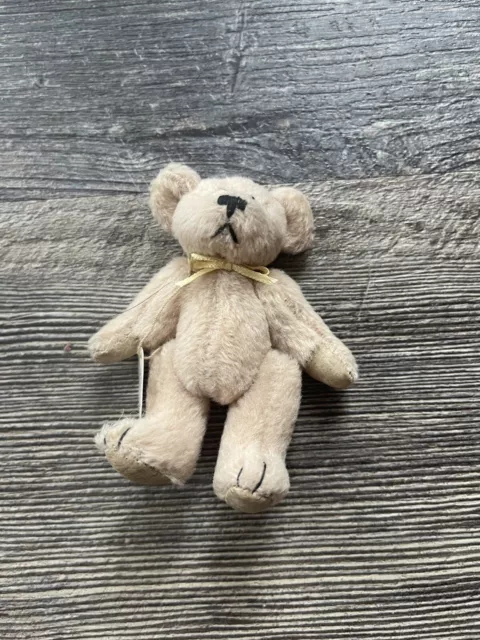 https://www.picclickimg.com/MaIAAOSwWW5lY5v1/Boyds-Bears-TF-Wuzzie-Miniature-Teddy-Bear.webp