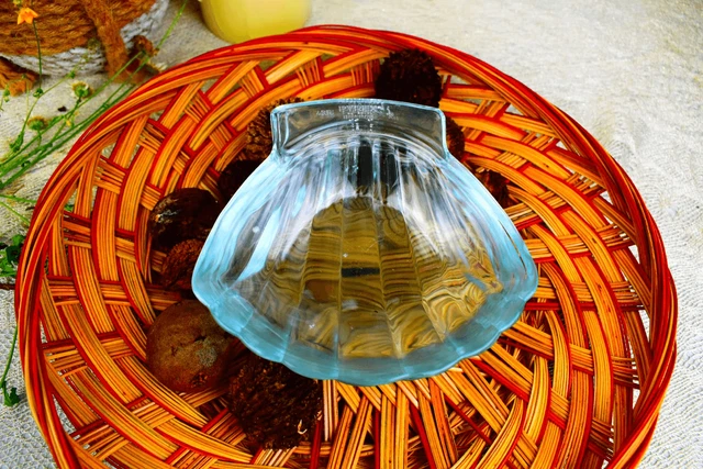 Set of four Pyrex shell, scalloped dipping dishes.