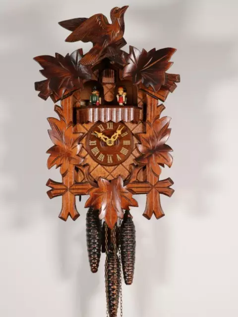 MUSICAL CUCKOO CLOCK with DANCING PEOPLE CAROUSEL plays two tunes WORKING ORDER