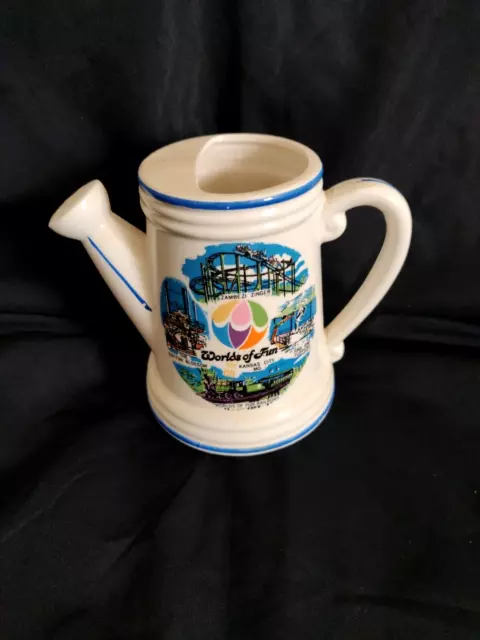 https://www.picclickimg.com/MdwAAOSwCjFkPWbA/Vintage-Worlds-of-Fun-Souvenir-Ceramic-Watering-Can.webp