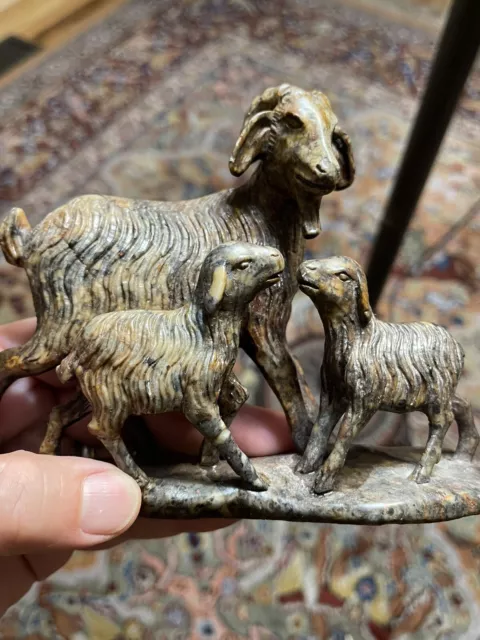 Antique Hand Carved Goats Sculpture “Stone” With Mahogany Stand .