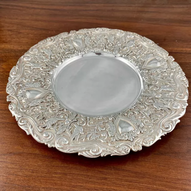 American Repousse Sterling Silver Hand Chased Plate Dolphins Birds Masks 10"