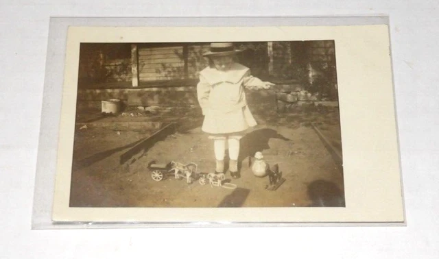 RPPC  Child with Toy Pull Horses and Wagons - Hat - Great Image 1911 Postcard