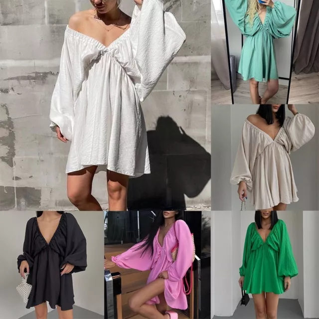 Robe de fête femme tendance avec manches bouffantes col en V et fioritures pour