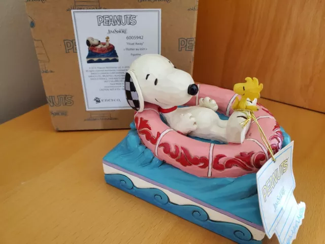 Jim Shore Peanuts Snoopy and Woodstock in Floatie figurine. 6005942. "Float Away