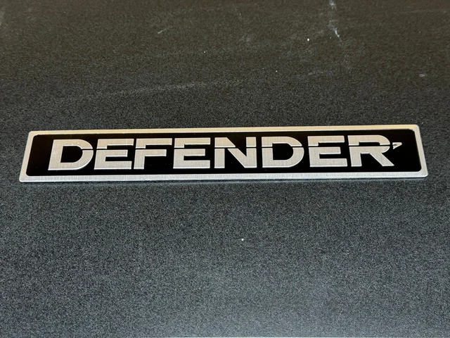 thumbnail image 2 of Land Rover Defender Black Oval Emblem Badge Kit (Front & Rear) 1987-2017 2 of 4