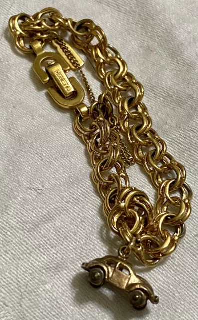 Pristine Vintage Golden Monet Charm Bracelet With Car VW Bug And Safety Chain
