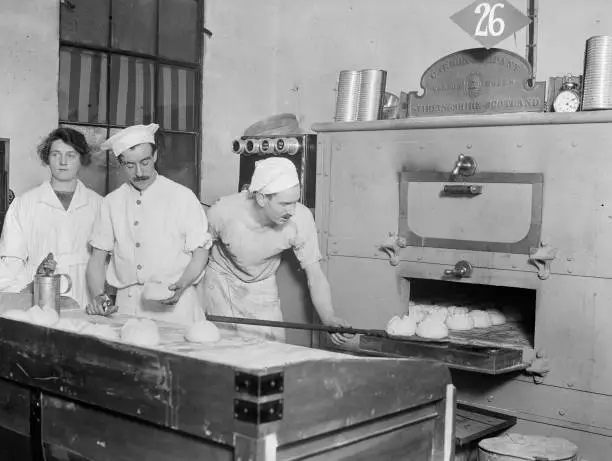 Bakers baking bread in an electric oven 1922 Old Photo