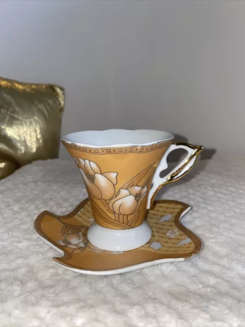 H &C demitasse tea cup and saucer gold coloer floral gold trim 3”