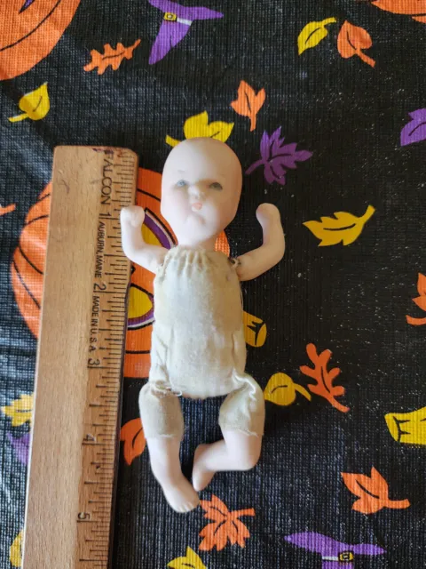 Vintage Bisque Porcelain Baby Doll w Blue Eyes Cloth Body 1940s 4.5"