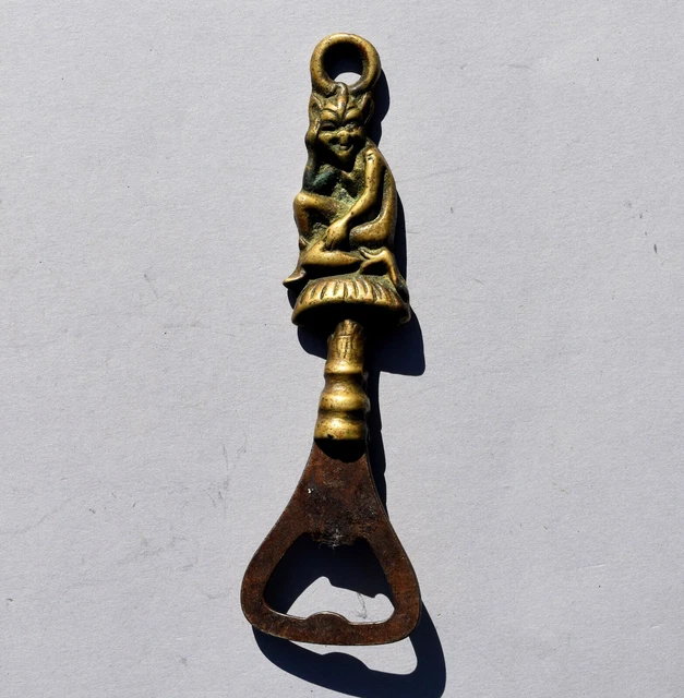 ancien décapsuleur bronze animalier