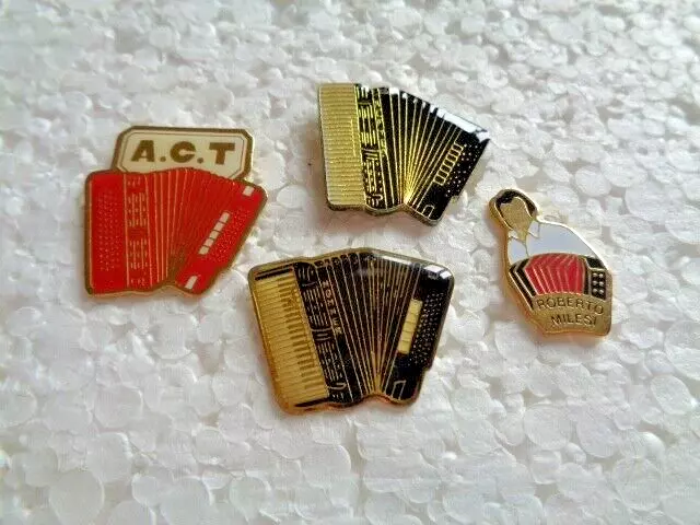 Job lot of 4 Accordian shaped metal lapel pins
