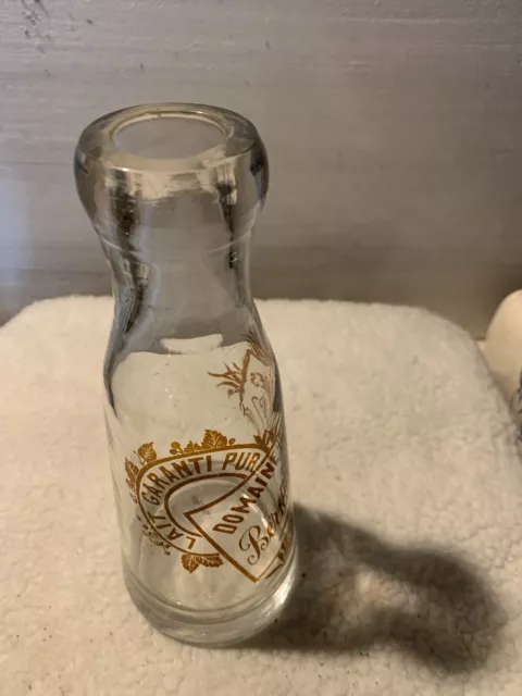 1 ancienne bouteille de lait Un Demi Litre