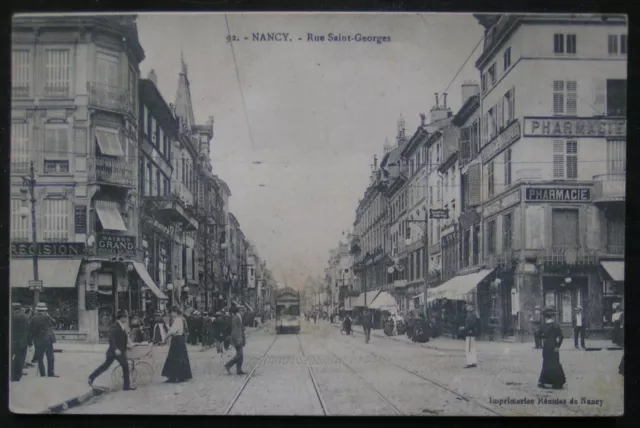 Cpa - Nancy (54) - Rue St Georges - Scene Animee - Commerces - Tramway  / 1919