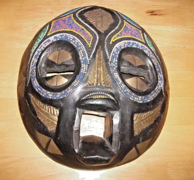 Large Carved Ashanti Sese Wooden Moon Mask Ghana inlaid with Brass and Beads.