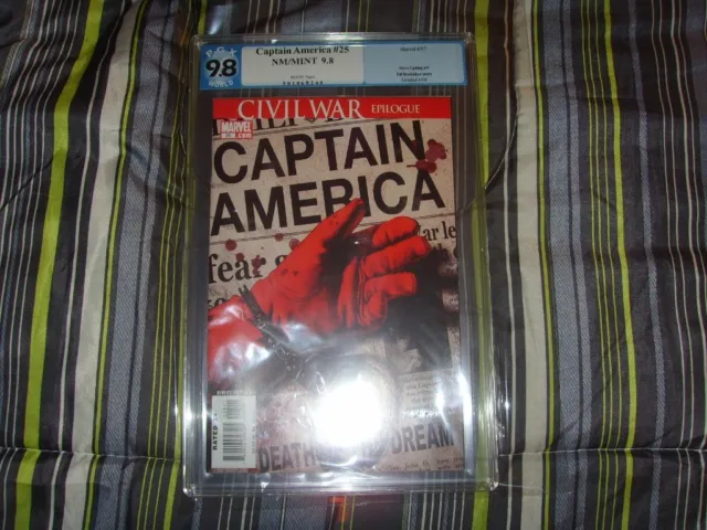 Captain America #25 Pgx Graded 9.8 Unrestored With White Pages