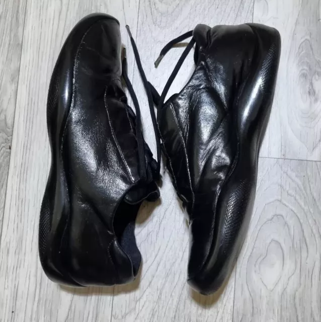 Womens black deals patent prada trainers