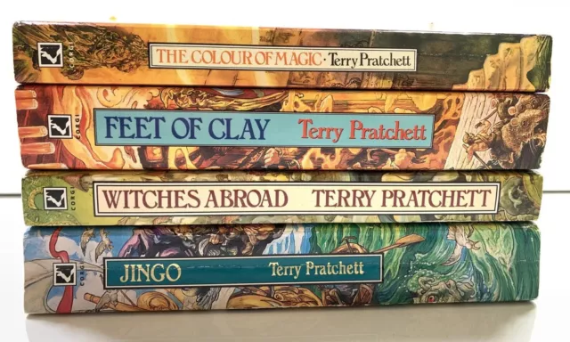 4x Terry Pratchett Discworld Books The Colour Of Magic Feet Of Clay Jingo Novels 2