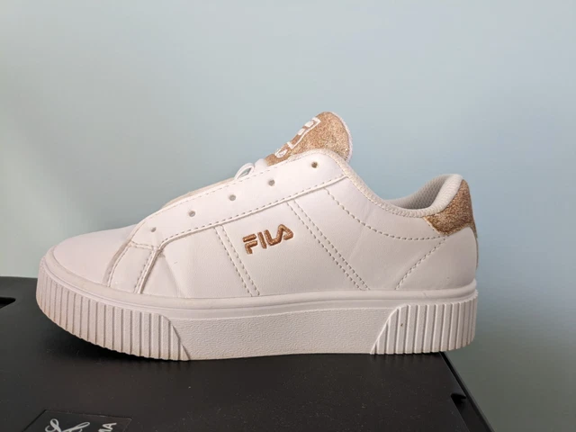 White patent sales fila trainers