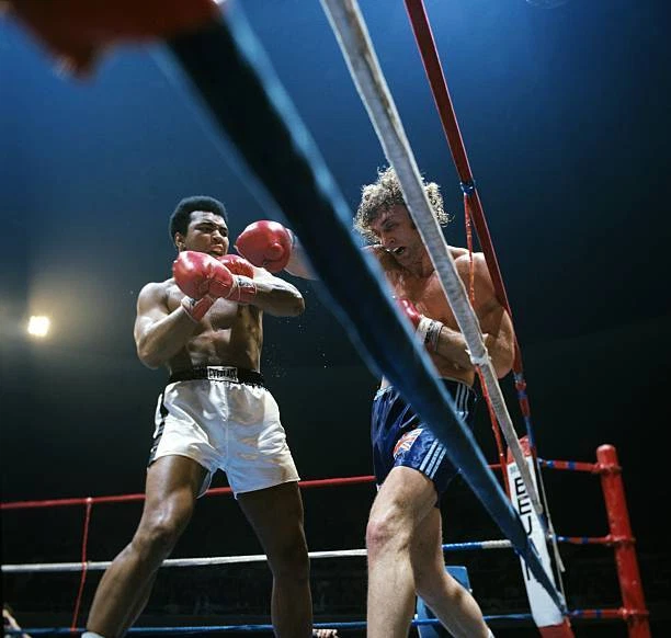 MUHAMMAD ALI IN action vs Joe Bugner during fight at Las Veg - 1973 Old
