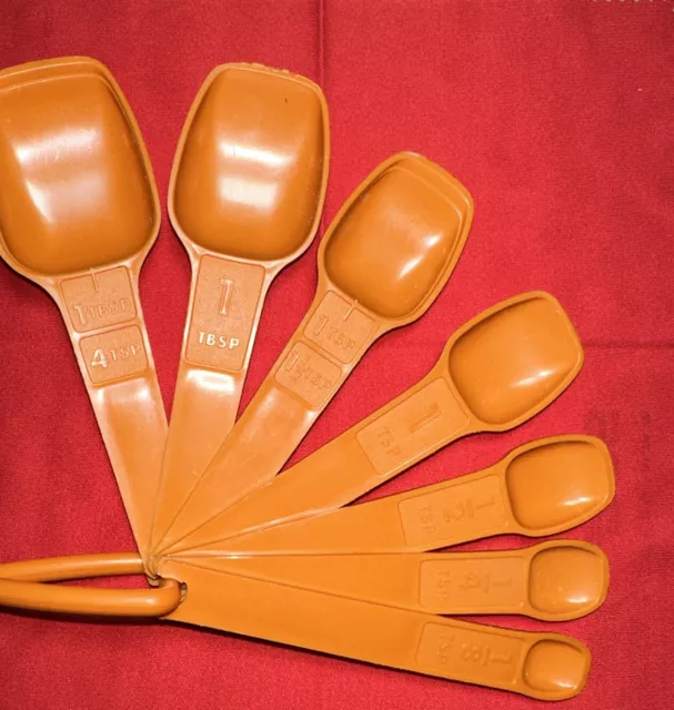 https://www.picclickimg.com/MxkAAOSwJJZlRbHF/Vintage-Orange-Tupperware-Nesting-Measuring-Spoons-Set-Of.webp