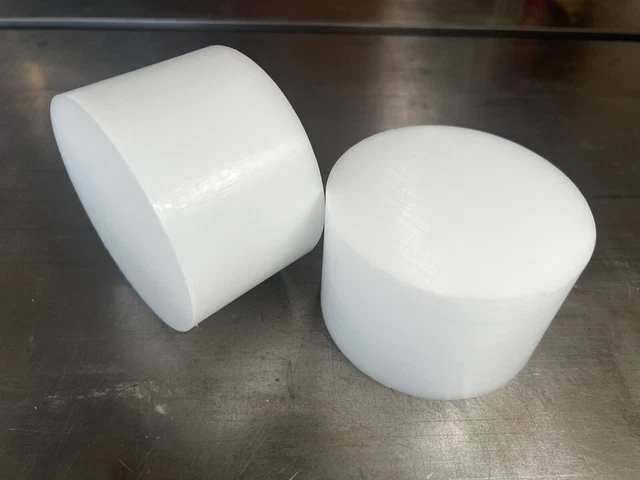 White Acetal Delrin Round Rod. 3.45” X 2.1875” tall. Lot of 20 cylinders.
