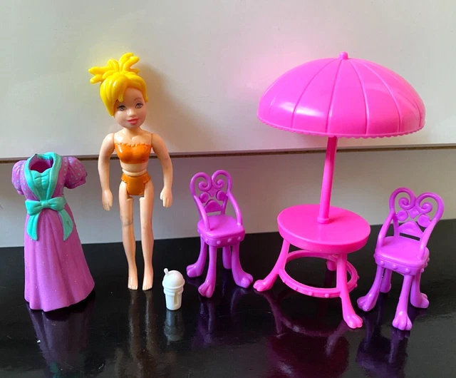 Mattel Polly Pocket Blonde Doll with Outfit & Toy Garden Parasol Set