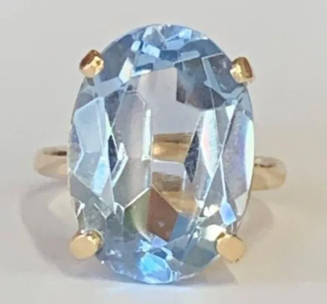 beautiful 8.15Ct Natural Oval Sky Blue Topaz Solitaire Ring 14k Yellow Gold over