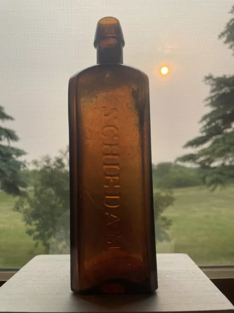 Aromatic Schnapps  Udolpho Wolfe’s Brown Bitters Bottle