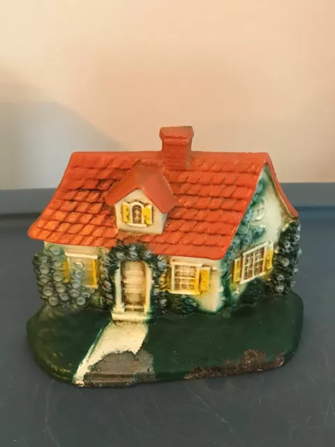 Cast Iron John Wright Cottage Doorstop