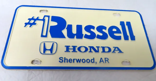 VTG Plastic Advertising License Plate Cover RUSSELL HONDA SHERWOOD AR