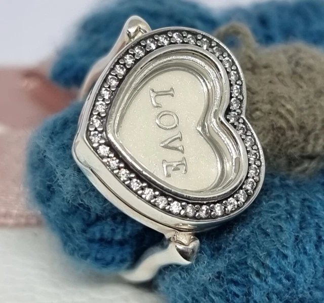 Sparkling pandora floating best sale heart locket ring